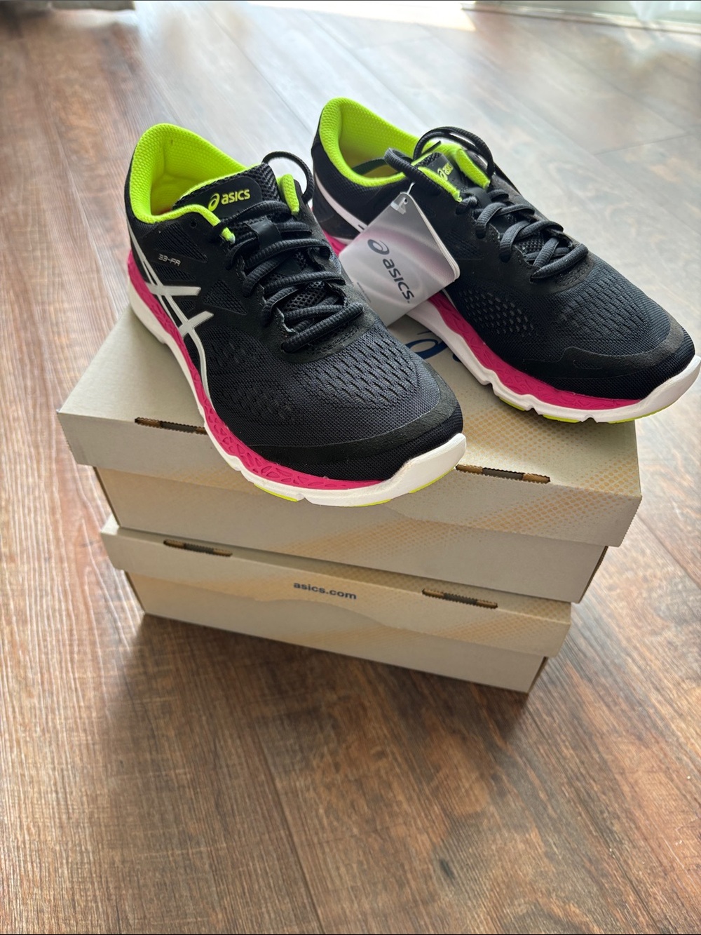 ASICS Black Running Shoes with Pink Midsole and Neon Green Lining